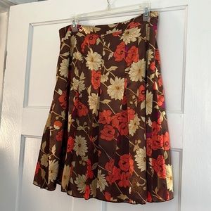 Lined Floral Skirt. Excellent condition. Never worn. Invisible back zipper.
